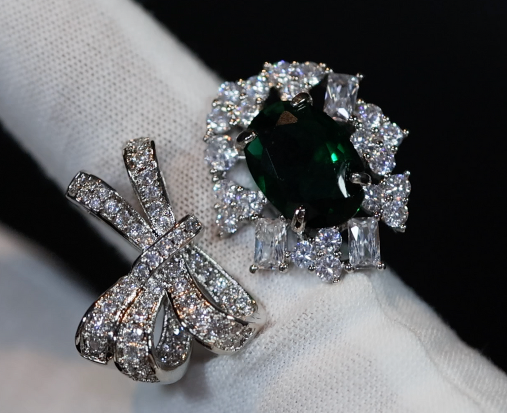 Emerald green diamond oval ring