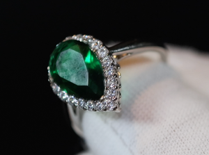 Emerald teardrop green diamond ring