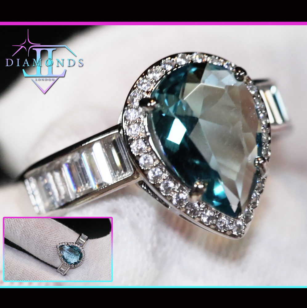 Teal blue teardrop diamond ring