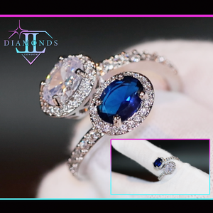 oval sapphire blue diamond engagement ring