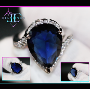 Pear cut blue diamond ring