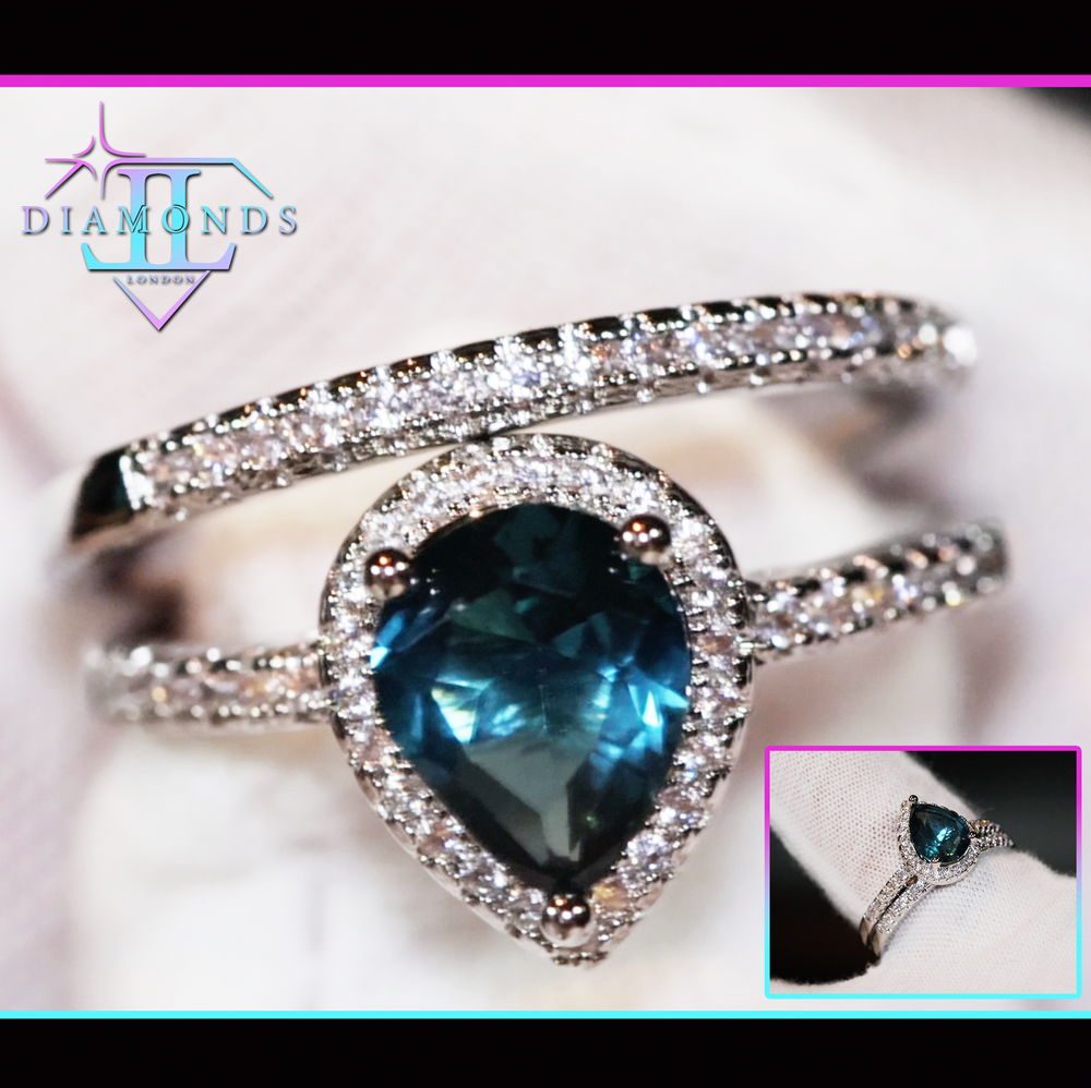 Teal blue teardrop diamond ring