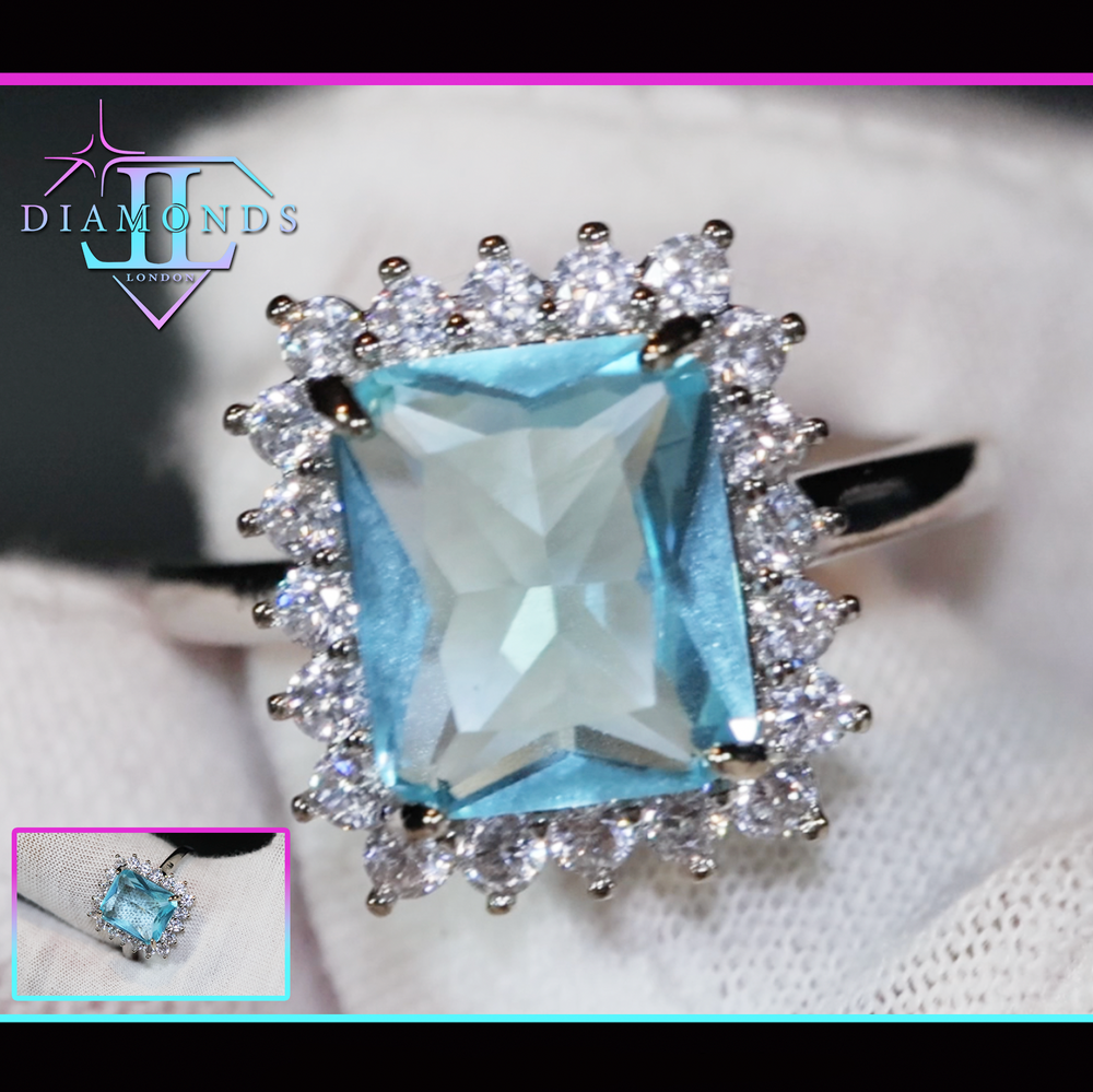 Aquamarine blue diamond engagement ring