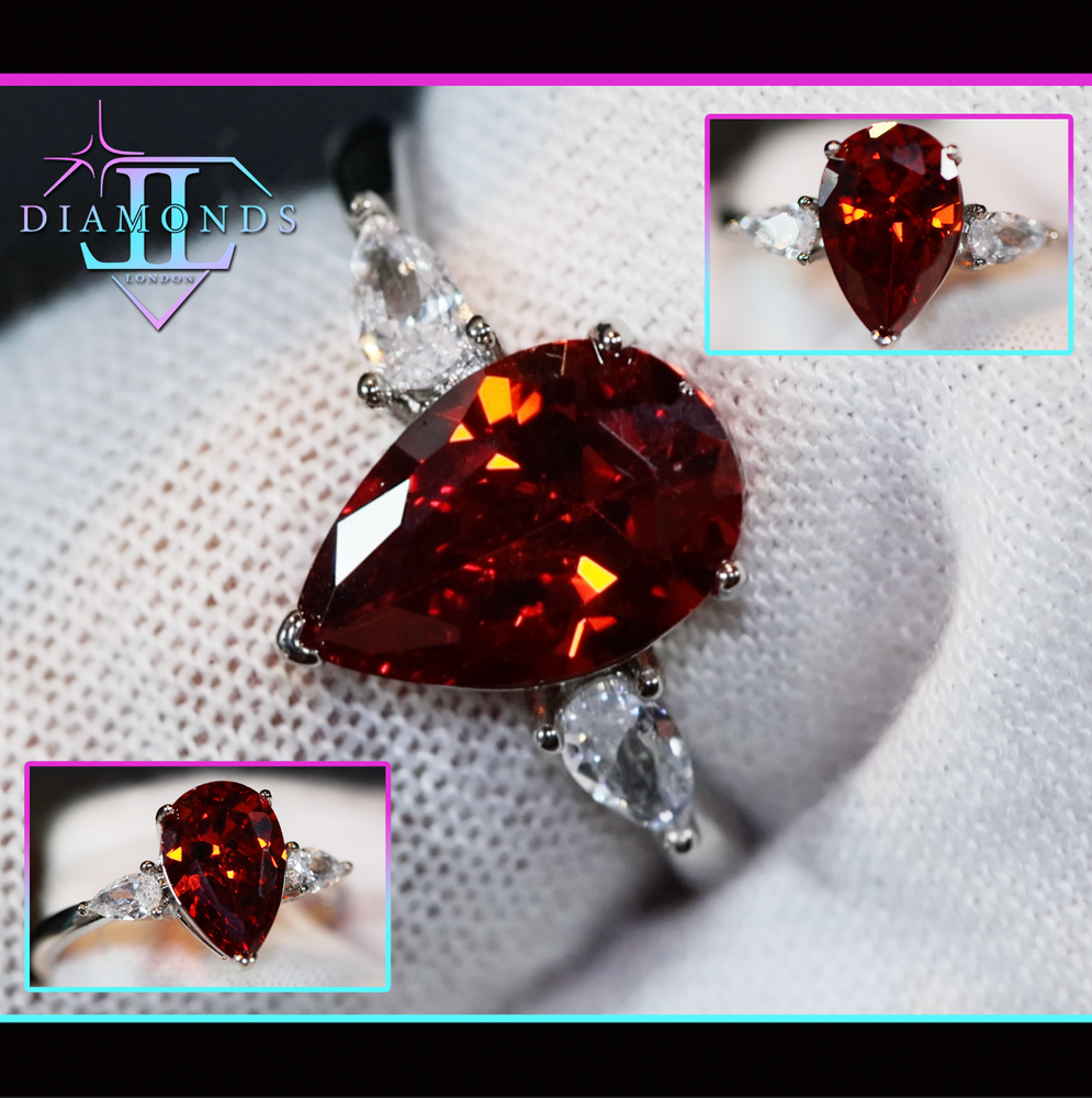 red pear cut diamond ring