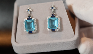 Womens big blue diamond earrings, Blue diamond earrings, Blue emerald cut diamond earrings