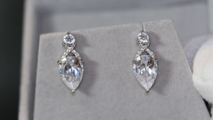 Pear cut diamond ear studs