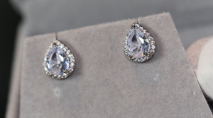 Pear cut diamond ear studs