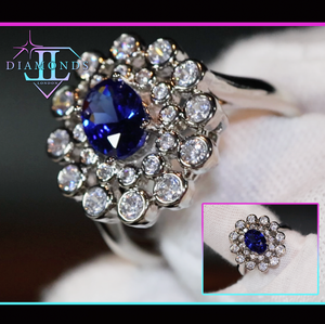 oval sapphire blue diamond engagement ring