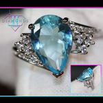 Aquamarine blue diamond engagement ring