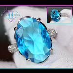 Oval aquamarine blue diamond ring