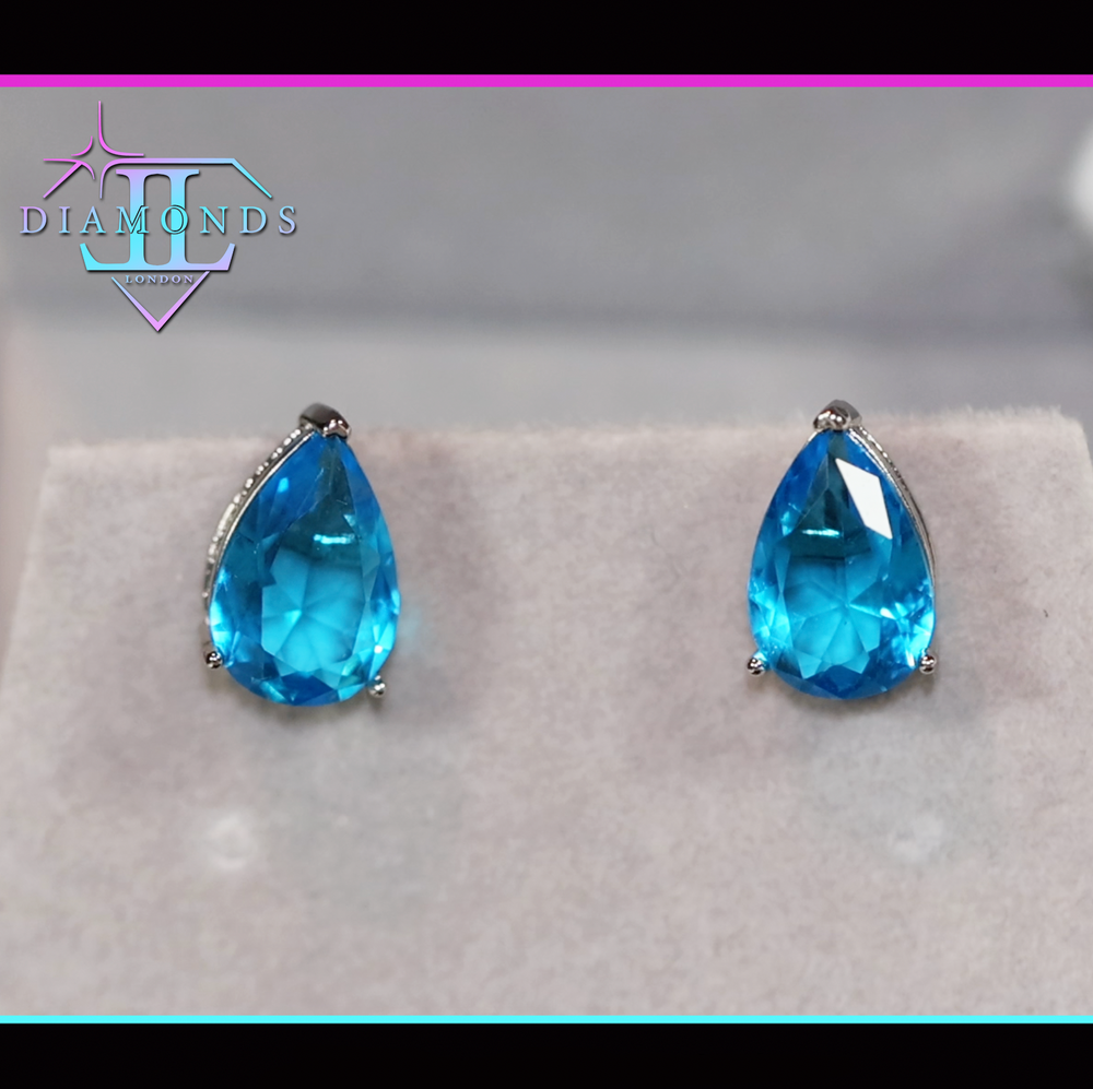 blue teardrop diamond ear studs