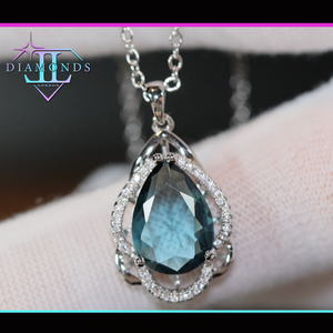 Teal blue diamond pendant