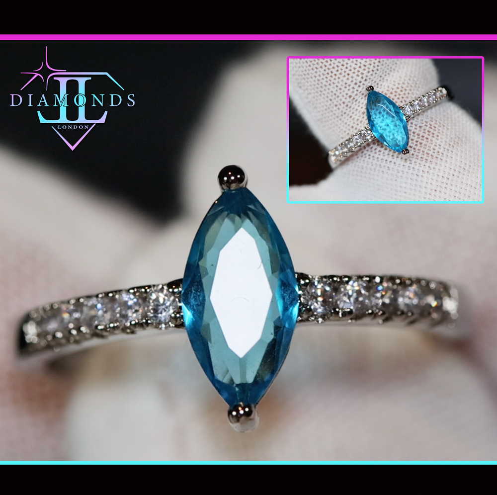 Blue marquise diamond ring