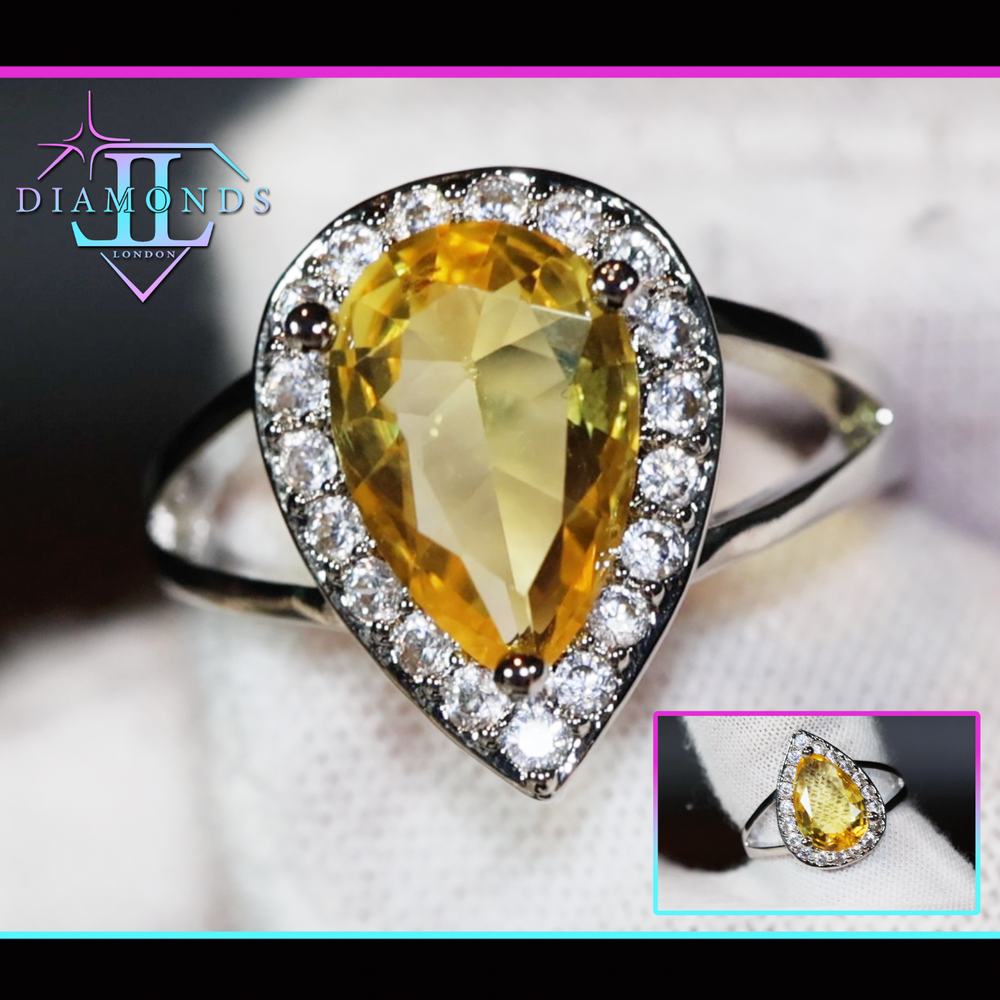 yellow pear cut diamond ring