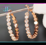 Big rose gold diamond hoop earrings