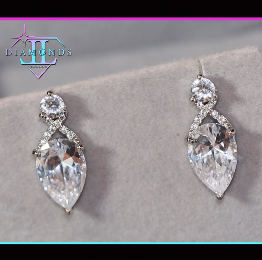 Pear cut diamond ear studs