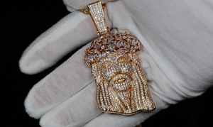 gold iced out jesus face