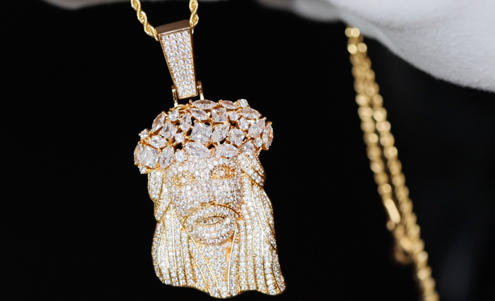 gold iced out jesus face