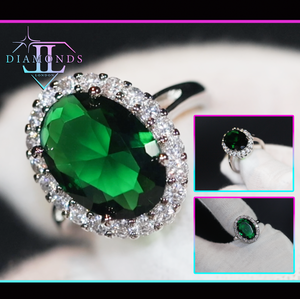 Emerald green oval diamond ring