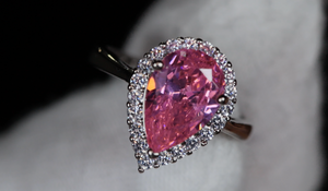 Pink pear cut diamond engagement ring