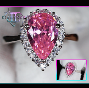 Pink pear cut diamond engagement ring