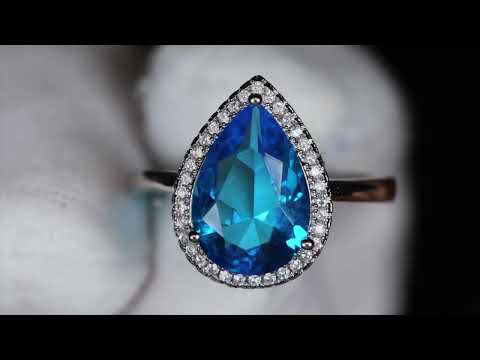 
            
                Load and play video in Gallery viewer, Womens Blue Pear Cut Diamond Ring
            
        