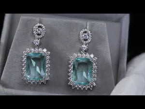 
            
                Load and play video in Gallery viewer, Womens big blue diamond earrings, Blue diamond earrings
            
        