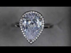 
            
                Load and play video in Gallery viewer, Pear cut diamond ring
            
        