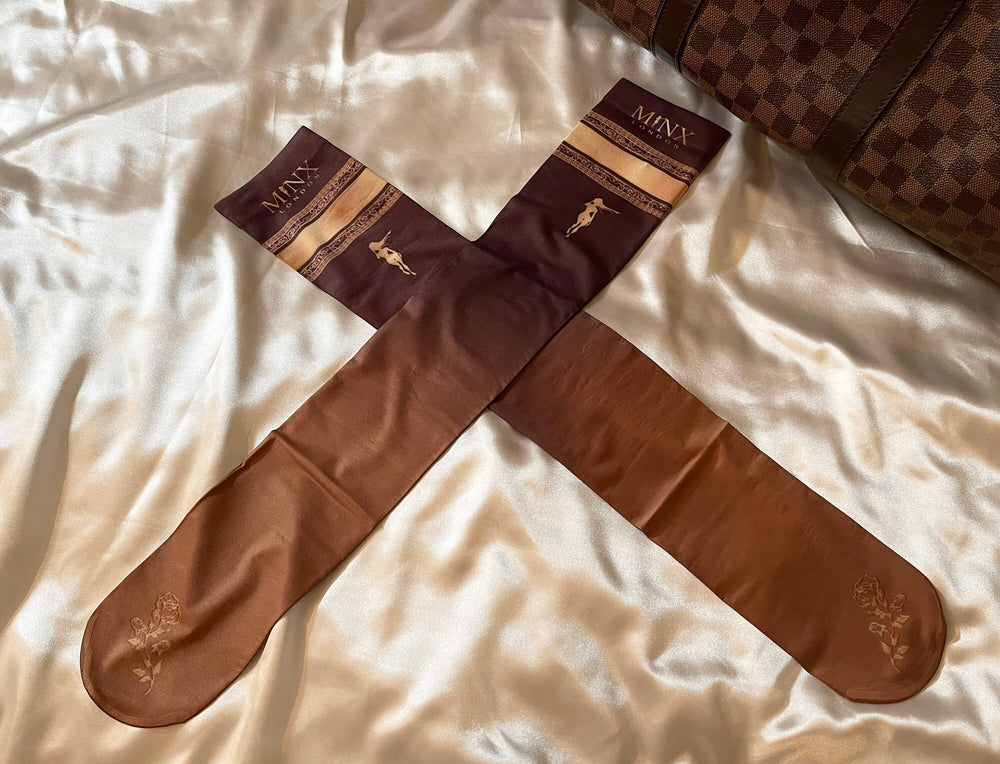 Why is Minx's sock brown 